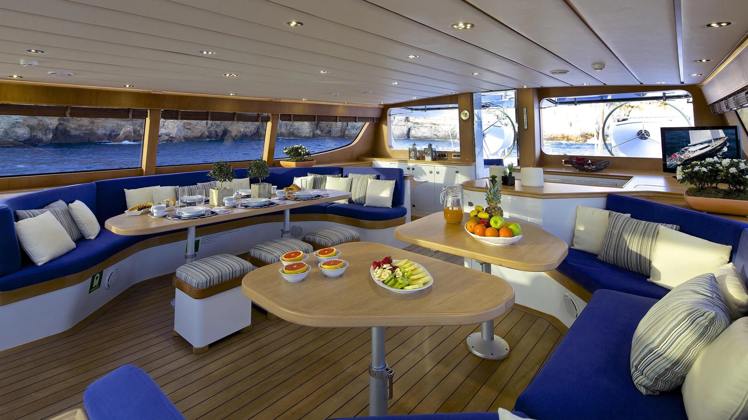 a room with a table and chairs aboard ALLURE A Yacht for Sale