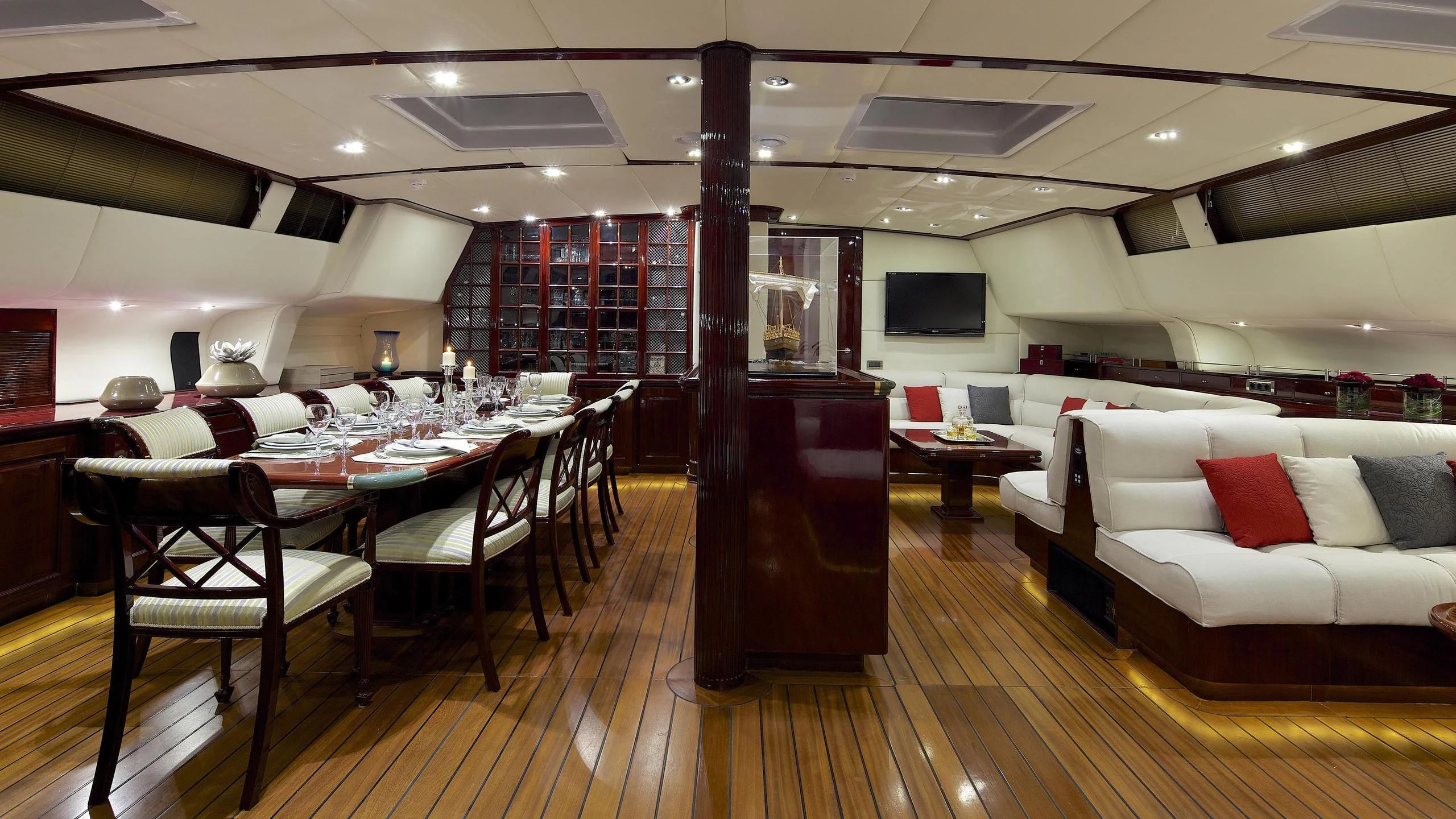 a large room with tables and chairs aboard ALLURE A Yacht for Sale