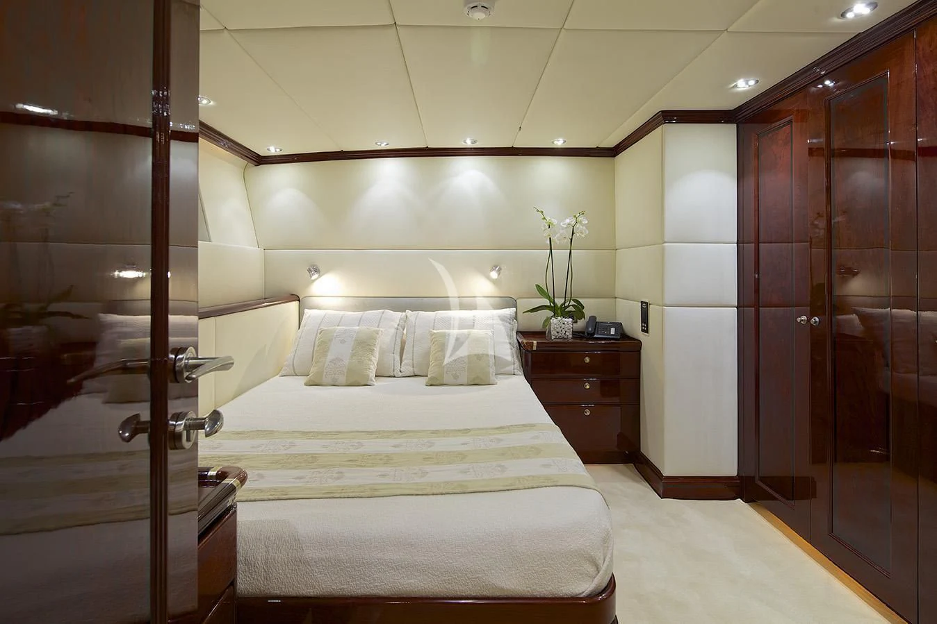 a room with a bed and a closet aboard ALLURE A Yacht for Sale