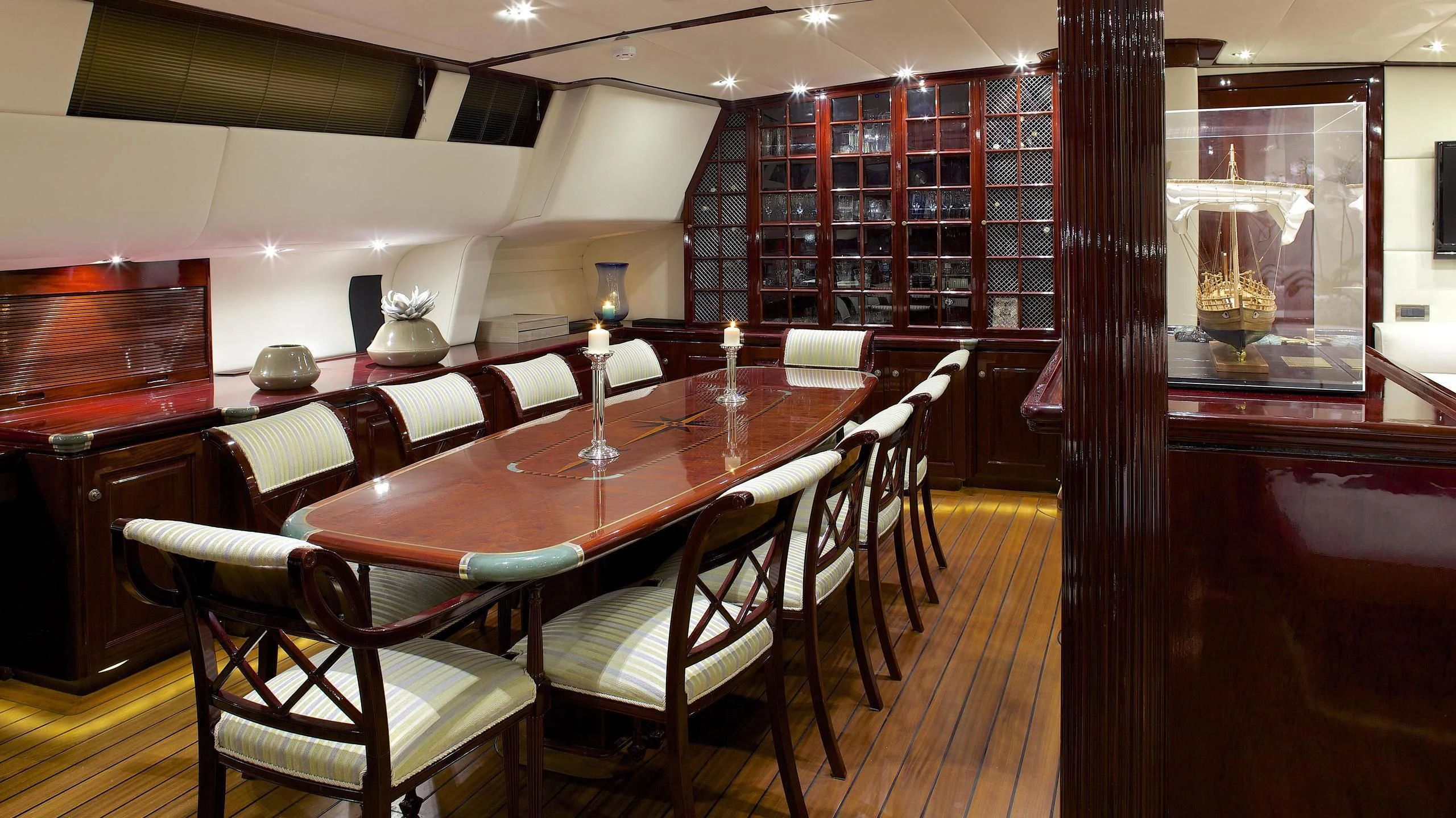 a restaurant with a table and chairs aboard ALLURE A Yacht for Sale
