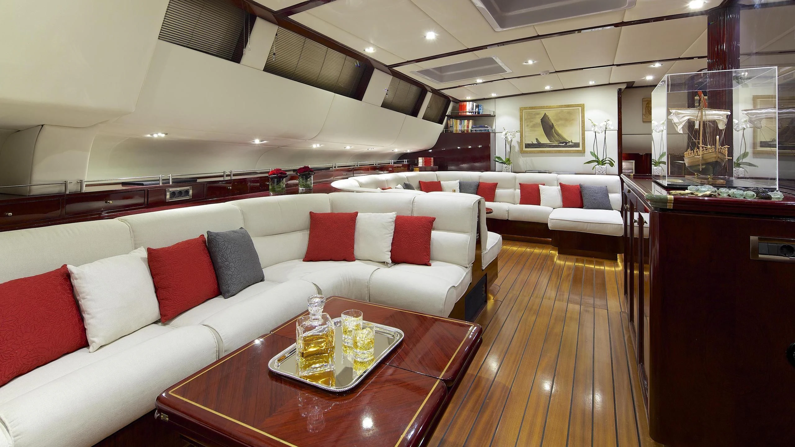 a room with a couch and a table aboard ALLURE A Yacht for Sale