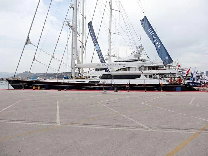 a large white boat in a parking lot aboard ALLURE A Yacht for Sale