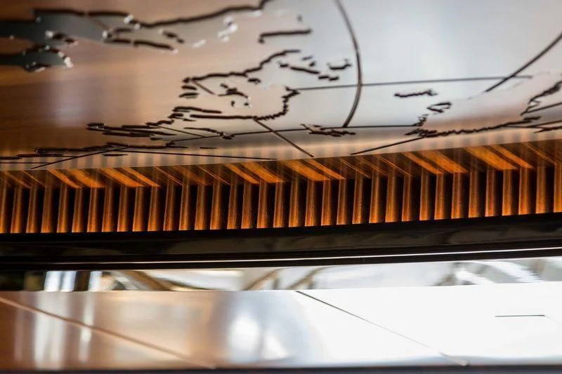 close-up of a piano aboard VIATORIS Yacht for Sale