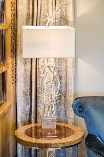 a bird on a lamp aboard VIATORIS Yacht for Sale