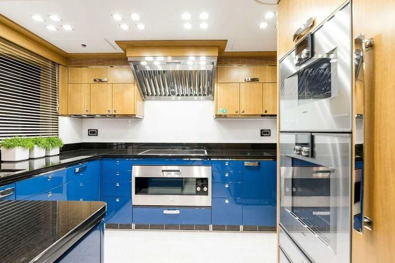 a kitchen with a microwave oven aboard VIATORIS Yacht for Sale