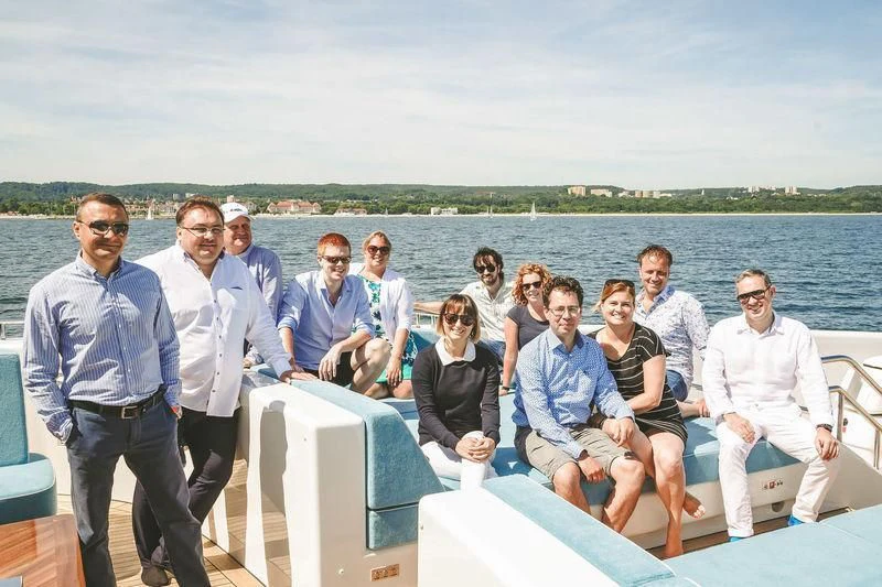 a group of people on a boat aboard VIATORIS Yacht for Sale