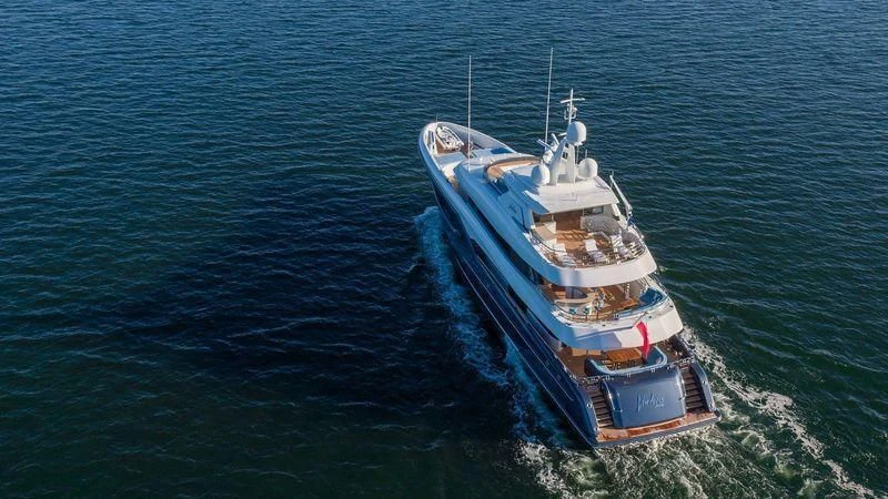 a large ship in the water aboard VIATORIS Yacht for Sale
