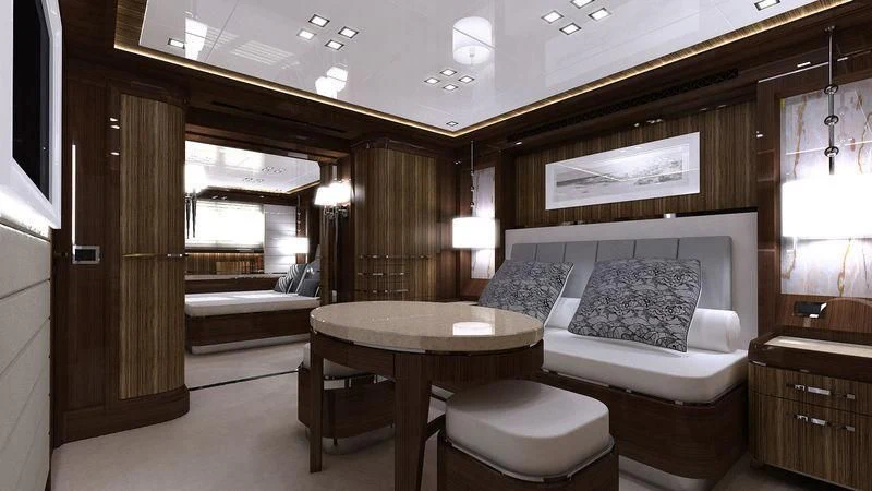 a room with a bed and a table aboard VIATORIS Yacht for Sale