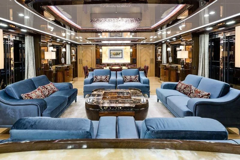 a living room with a large open floor plan aboard VIATORIS Yacht for Sale