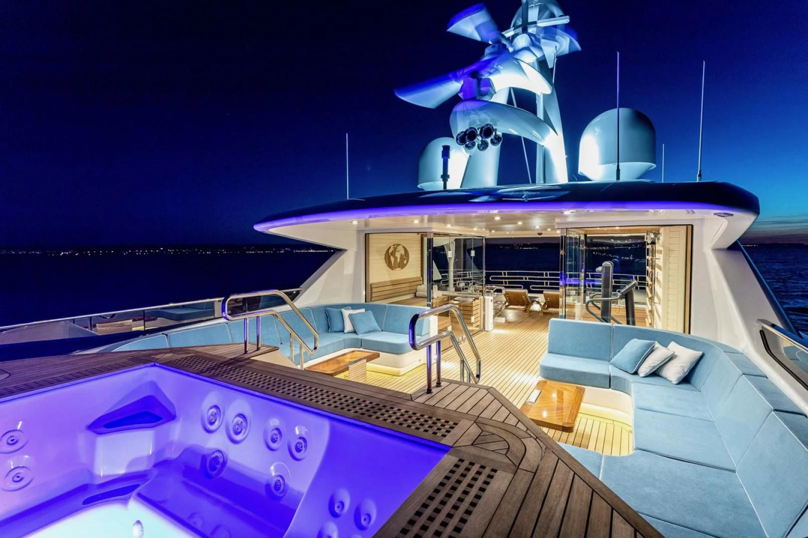 a large pool with a deck and a pool table aboard VIATORIS Yacht for Sale