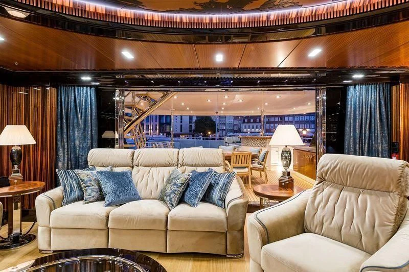a living room with a large window aboard VIATORIS Yacht for Sale