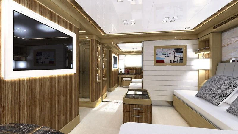 a room with a bed and a television aboard VIATORIS Yacht for Sale