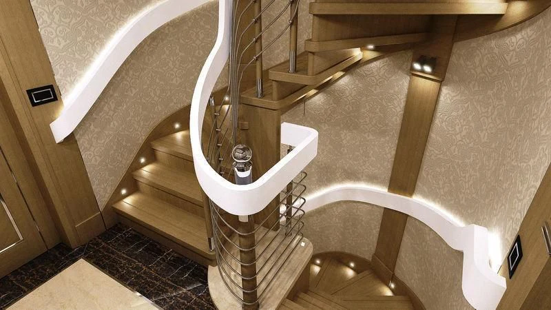 a staircase with a metal railing aboard VIATORIS Yacht for Sale