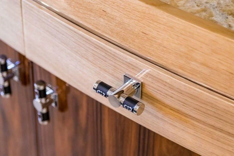 a close-up of a door handle aboard VIATORIS Yacht for Sale