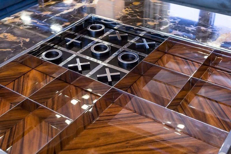 a wooden board with knobs aboard VIATORIS Yacht for Sale
