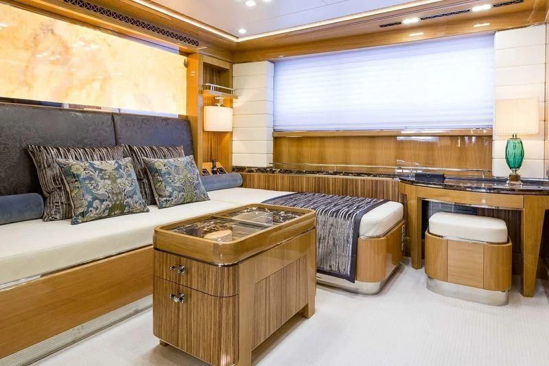 a room with a bed and a desk aboard VIATORIS Yacht for Sale
