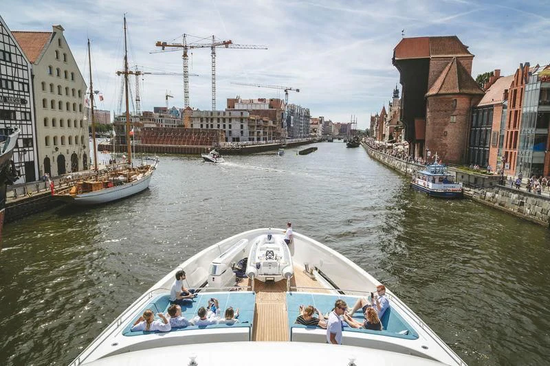 a group of people on a boat aboard VIATORIS Yacht for Sale