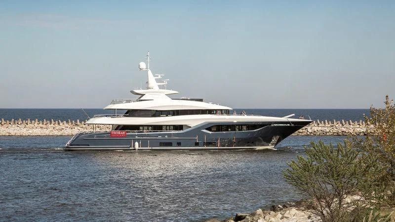 a large boat on a body of water aboard VIATORIS Yacht for Sale