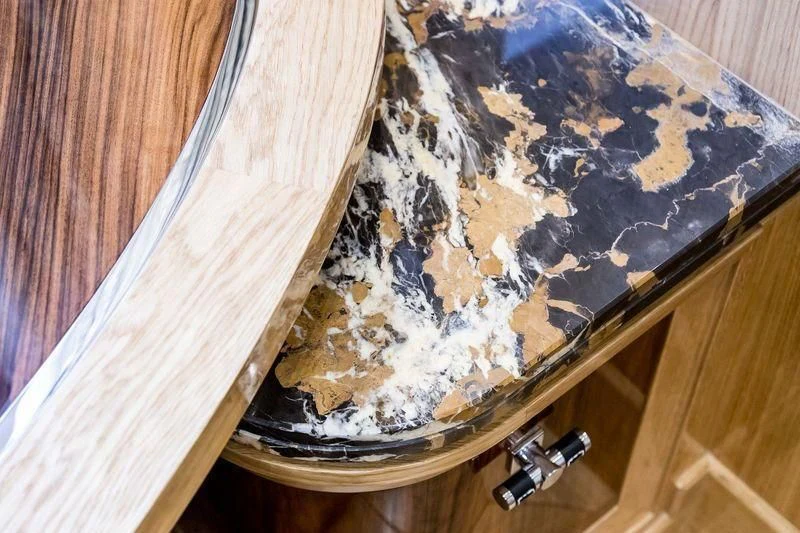 a metal bucket with a black and gold pattern on it aboard VIATORIS Yacht for Sale