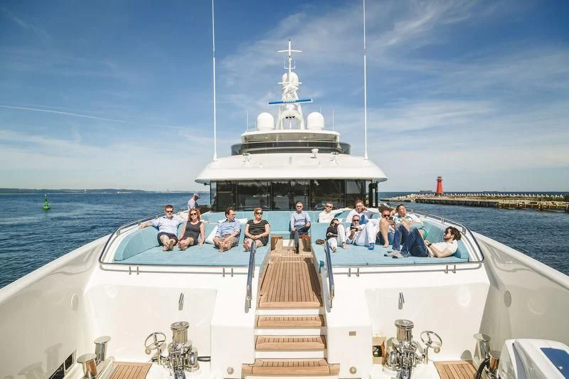 a group of people on a boat aboard VIATORIS Yacht for Sale
