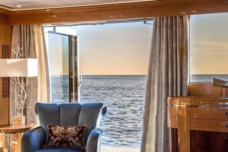 a room with a view of the ocean aboard VIATORIS Yacht for Sale