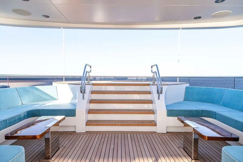 a room with a staircase and a window aboard VIATORIS Yacht for Sale