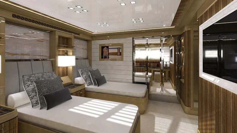 a room with a bed and a couch aboard VIATORIS Yacht for Sale