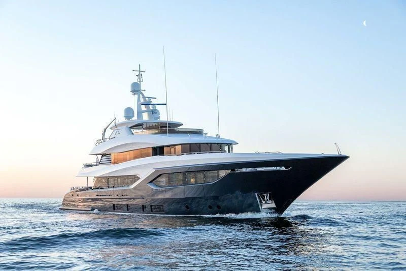 a large ship in the water aboard VIATORIS Yacht for Sale