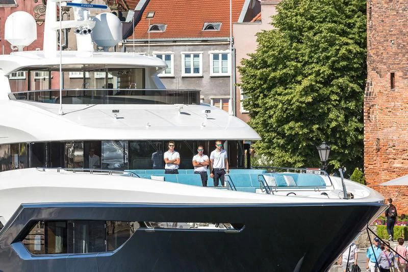 a white car with people on it aboard VIATORIS Yacht for Sale