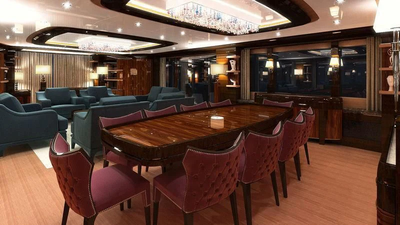 a large room with a table and chairs aboard VIATORIS Yacht for Sale