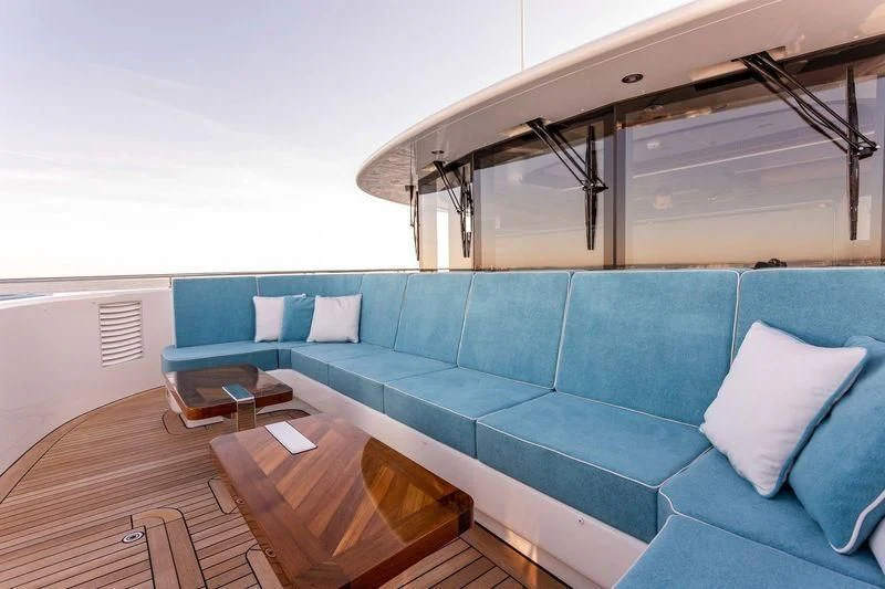 a living room with a couch aboard VIATORIS Yacht for Sale