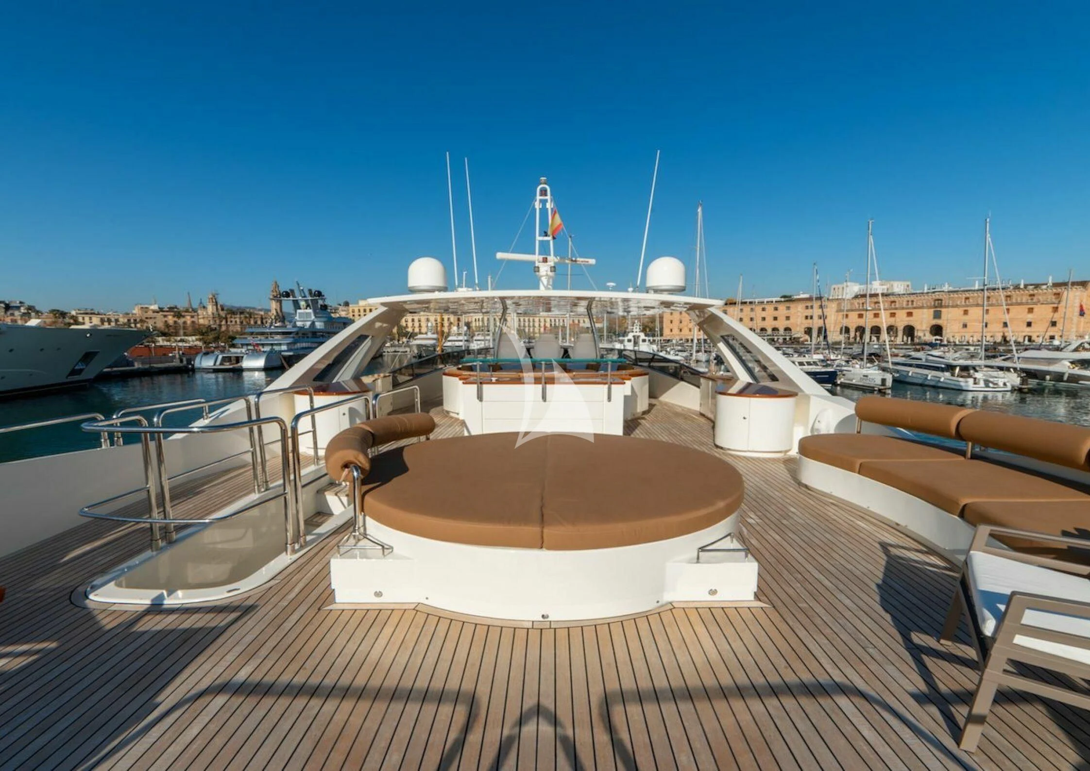 a large boat on a dock aboard GRACE Yacht for Sale