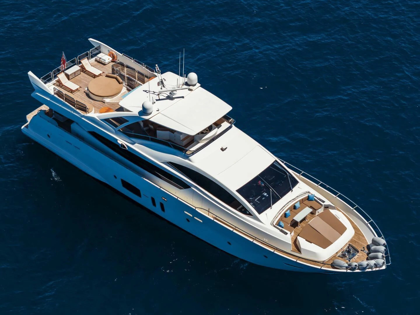 a white boat in the water aboard GRACE Yacht for Sale