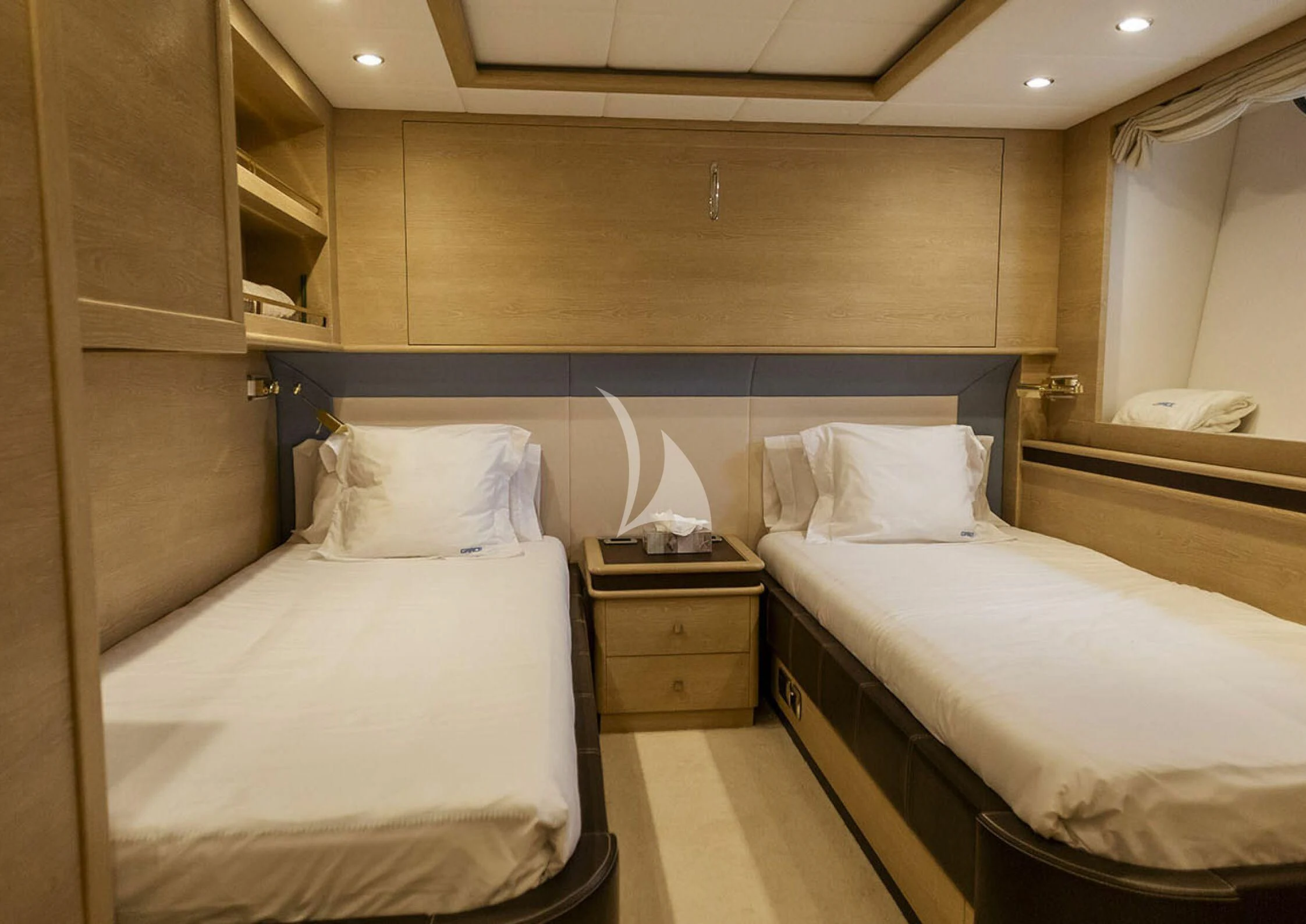 a couple of beds in a hotel room aboard GRACE Yacht for Sale