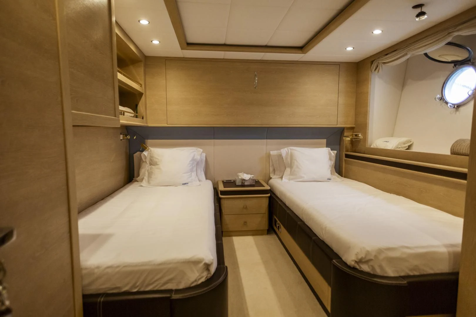a room with two beds aboard GRACE Yacht for Sale