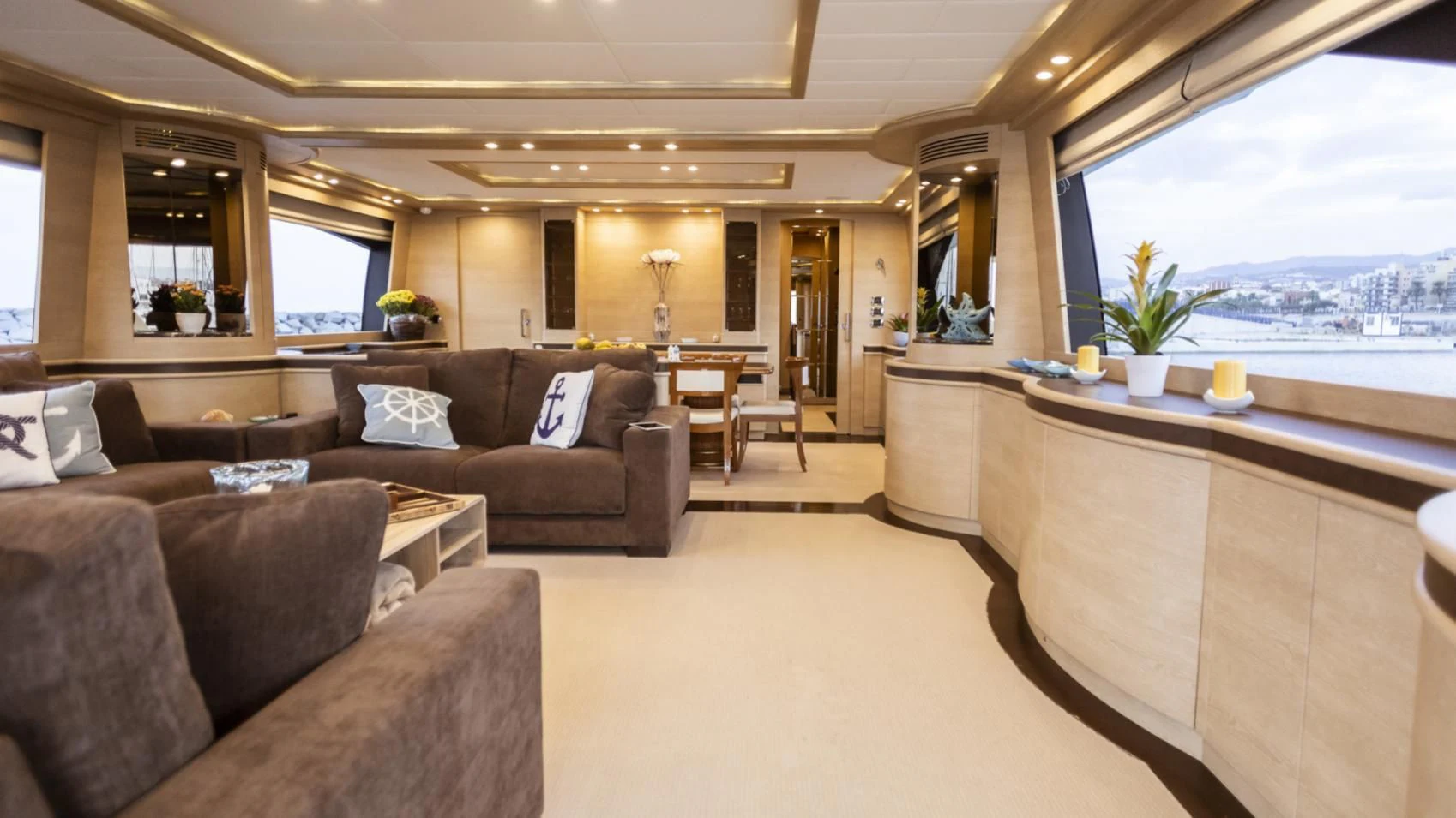 a living room with a large window aboard GRACE Yacht for Sale