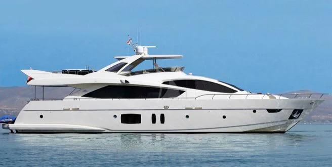 a white yacht on the water aboard GRACE Yacht for Sale