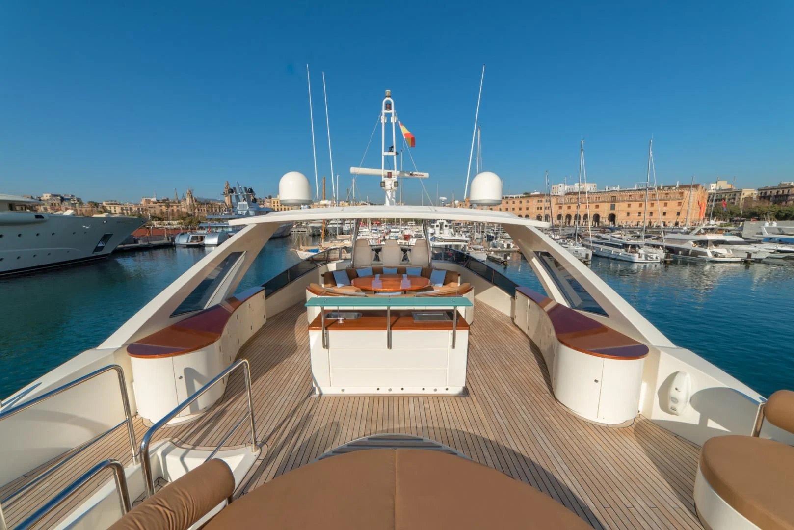 a boat docked at a pier aboard GRACE Yacht for Sale