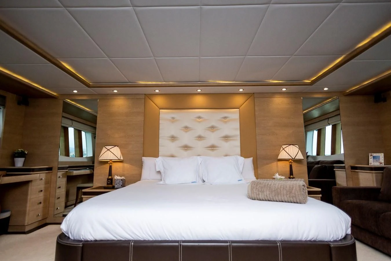 a large bed in a room aboard GRACE Yacht for Sale
