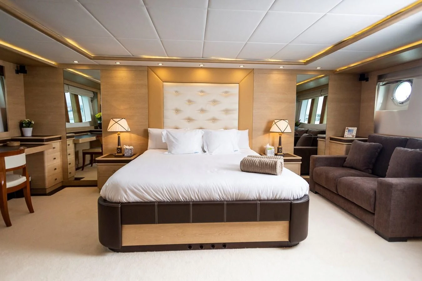 a large bed in a hotel room aboard GRACE Yacht for Sale