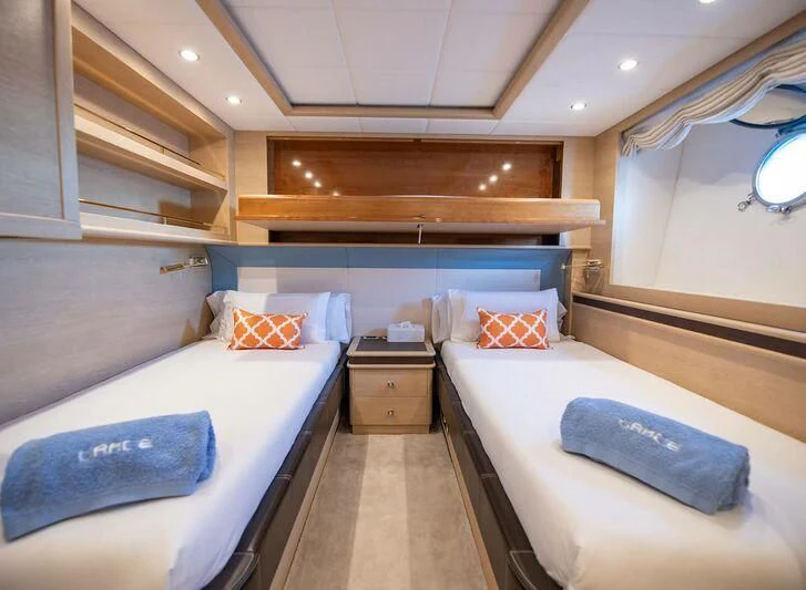 a room with two beds aboard GRACE Yacht for Sale