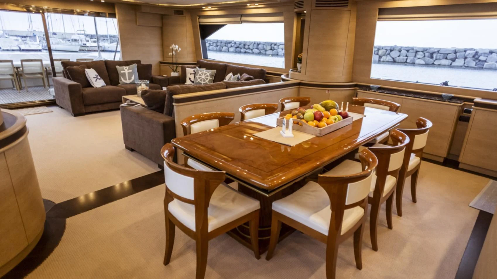 a table with chairs around it aboard GRACE Yacht for Sale