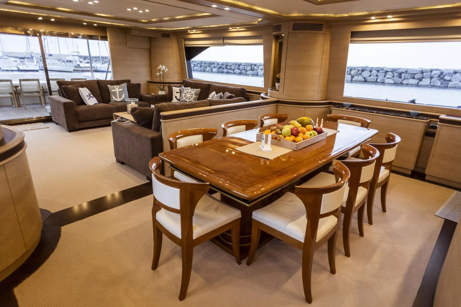 a table with chairs around it aboard GRACE Yacht for Sale