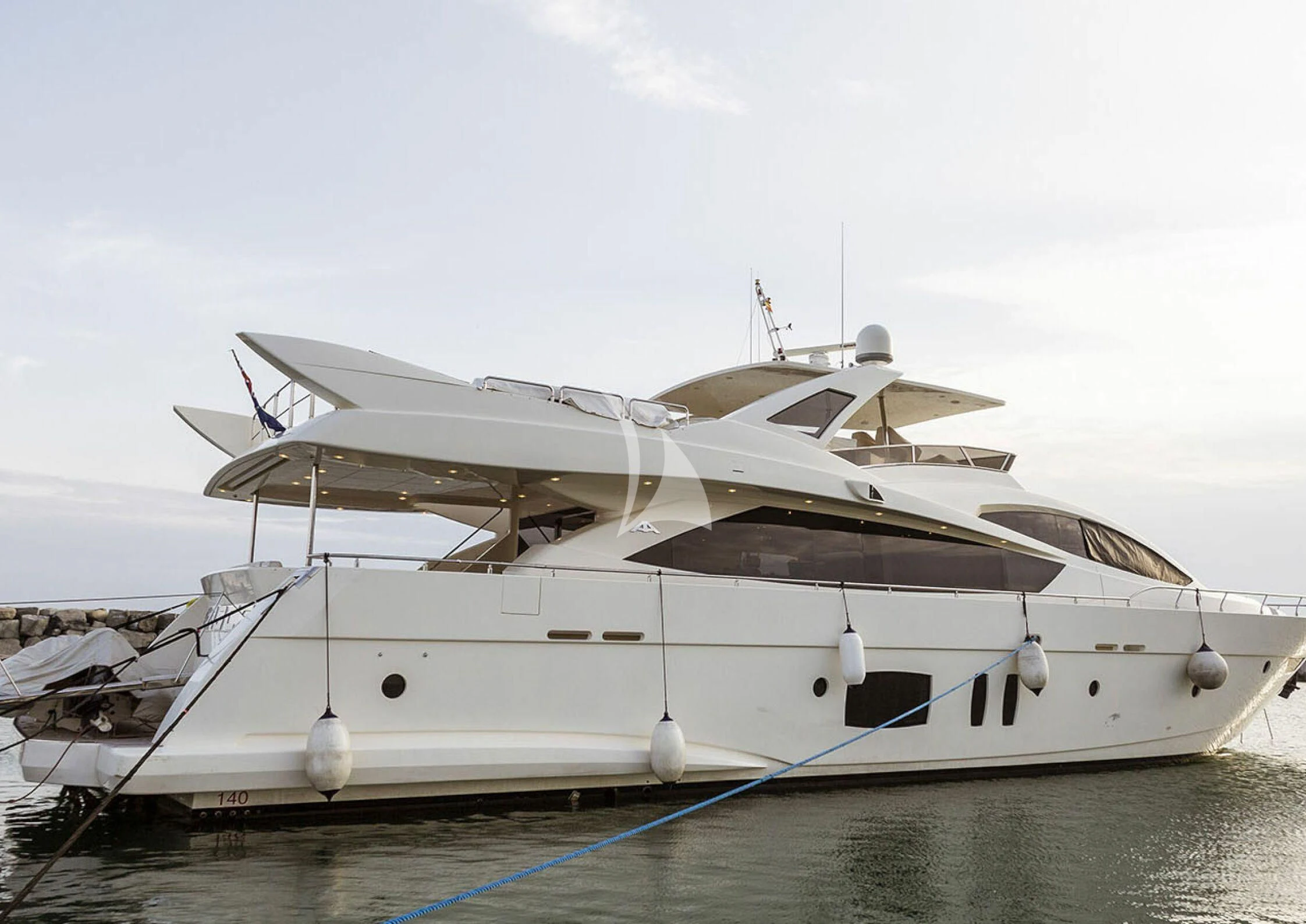 a white boat in the water aboard GRACE Yacht for Sale