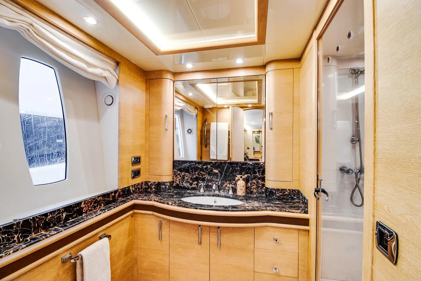 a bathroom with a marble counter top aboard GRACE Yacht for Sale
