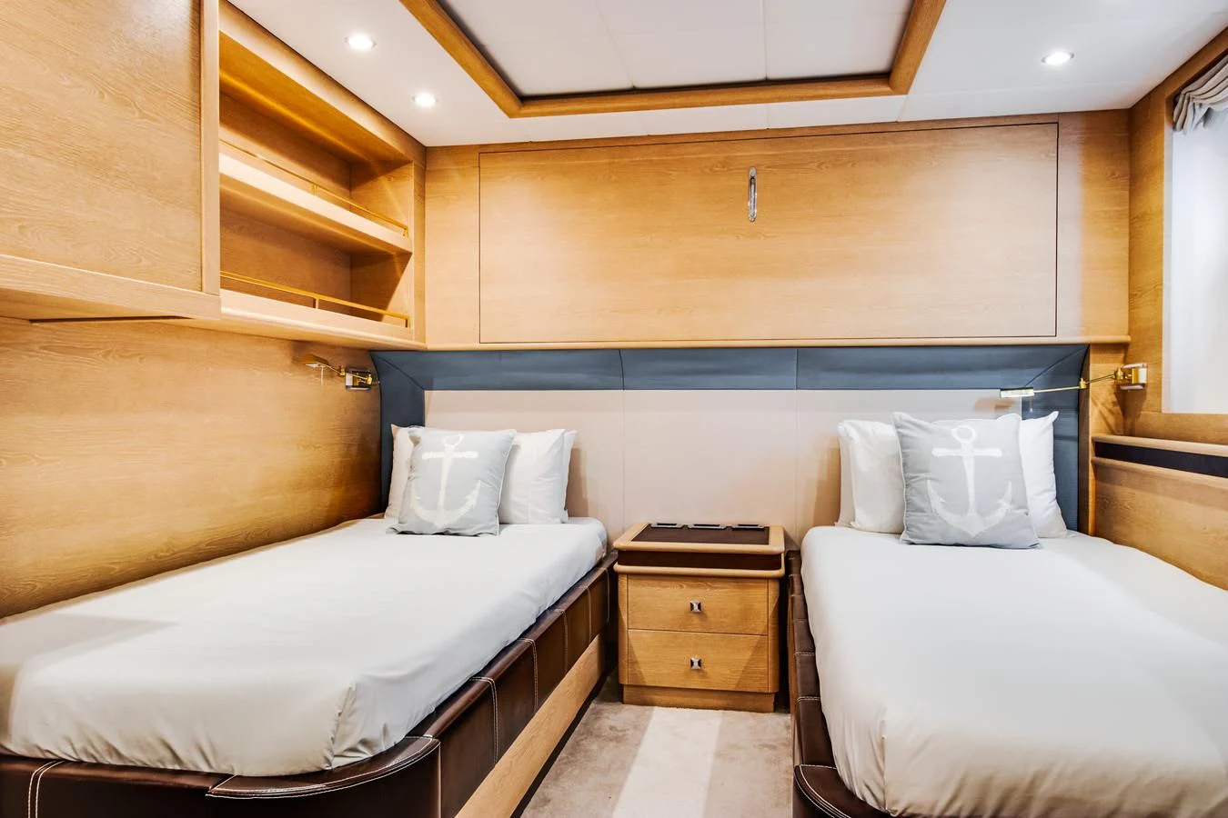 a room with two beds aboard GRACE Yacht for Sale