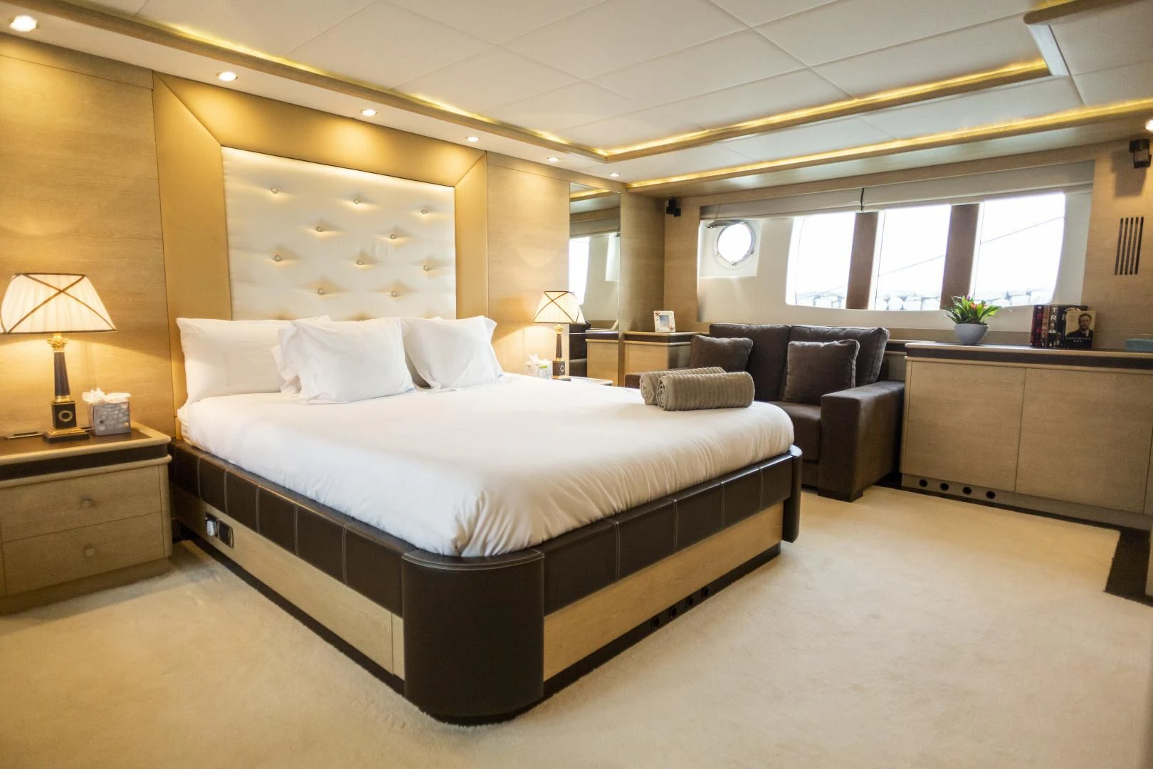 a large bed in a room aboard GRACE Yacht for Sale