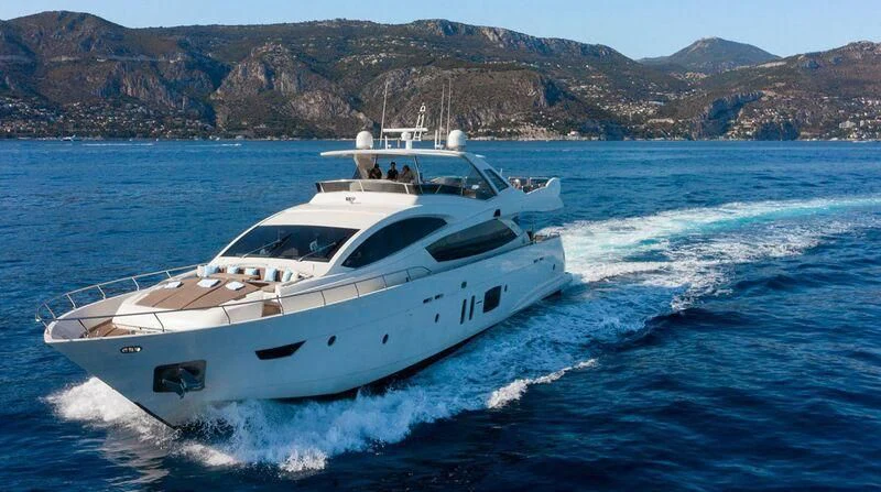 a white yacht on the water aboard GRACE Yacht for Sale