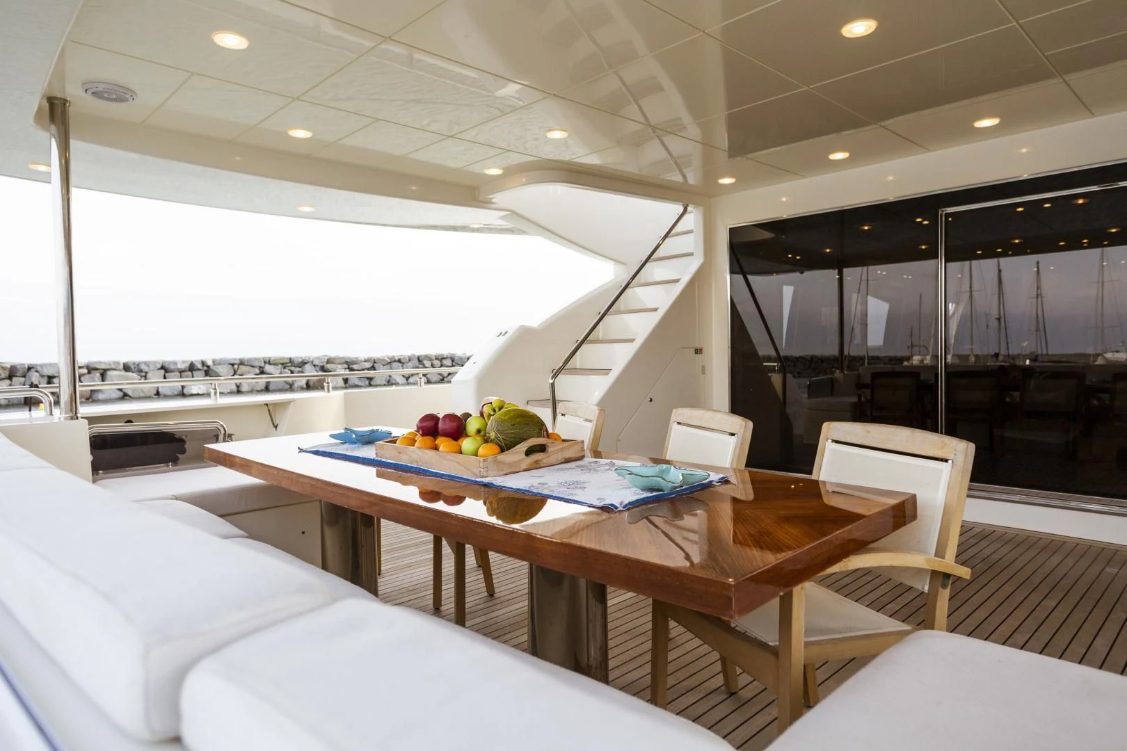 a room with a table and chairs aboard GRACE Yacht for Sale