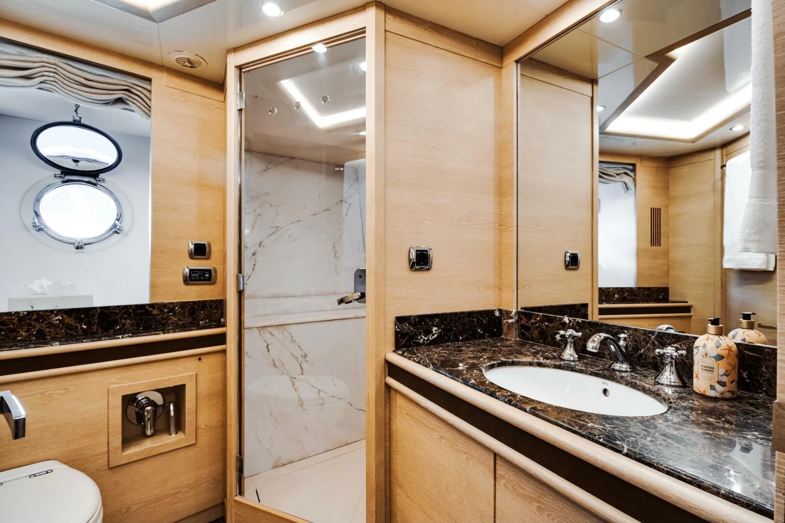 a bathroom with a sink and a shower aboard GRACE Yacht for Sale